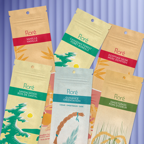 Six different packages of incense sticks lay in two rows against a purple background. The back row includes Vanilla, Canadian Forest and Egyptian Musk, and the front row includes Sandalwood, Guidance and Sweetgrass.