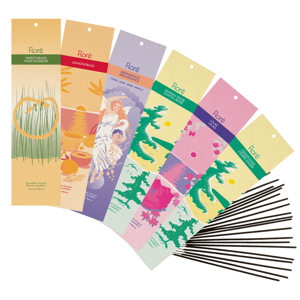 An array of our best garden vibes incense fragrances at Floré Incense. Sweetgrass, Lemongrass, Abundance, Sandal-Rose, Lilac and Cedar-Sage. Packages are shown fanned out with 20 incense sticks beside them.