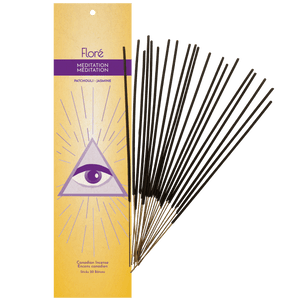 Image of 1 package of Flore Canadian Incense Meditation fragrance, featuring the third eye on a golden background. There are 20 incense sticks splayed beside it as every package contains 20 incense sticks. Scent notes displayed are patchouli, jasmine.