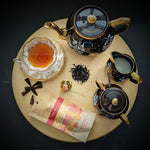 Flore Patchouli Incense Cones paired with afternoon tea. 