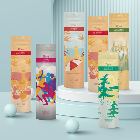Six different packages of incense sticks standing upright against a grey background. From left to right the packages include Coconut, Love, Summer, Lemongrass, Sandal-Rose and Sweetgrass. 