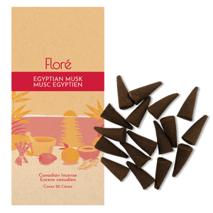 
            
                Load image into Gallery viewer, Image of Flore Canadian Incense Egyptian Musk package, featuring a strawberry, orange, cinnamon stick, mortar and pestle on a warm beach. There are 20 incense cones splayed beside it as every package contains 20 incense
            
        