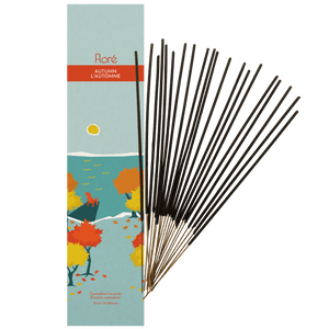 
            
                Load image into Gallery viewer, Image of Flore Canadian Incense Autumn package, featuring fall colour maple trees on a blue lake with a yellow sun. There is a dock with a muskoka chair. There are 20 incense sticks splayed beside it as every package contains 20 incense sticks. 
            
        