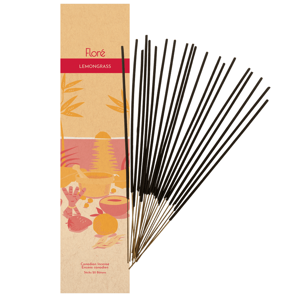 Image of Flore Canadian Incense Lemongrass package, featuring a strawberry, orange, cinnamon stick, mortar and pestle on a warm beach. There are 20 incense sticks splayed beside it as every package contains 20 incense sticks