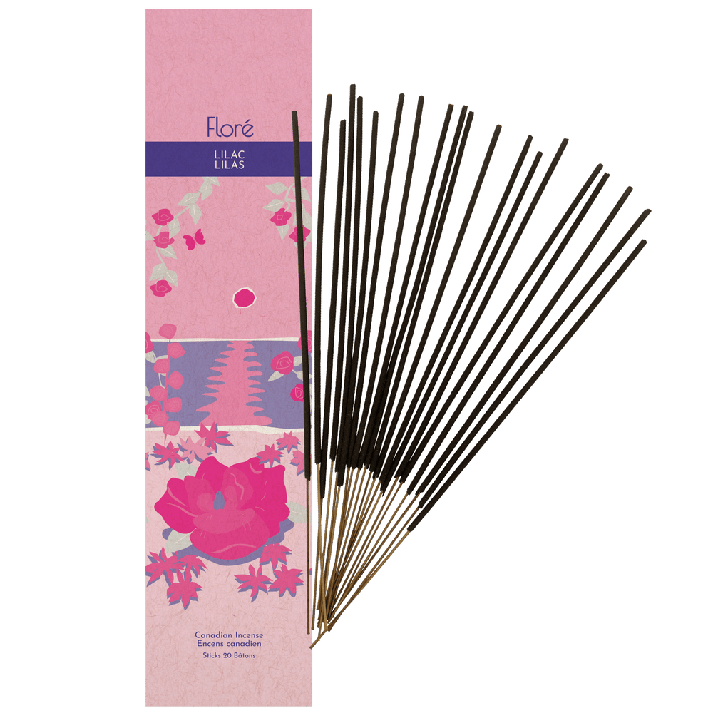 Image of Flore Canadian Incense Lilac package, featuring a prominent rose flower on a beach with smaller flowers around it.There are 20 incense sticks splayed beside it as every package contains 20 incense sticks. 