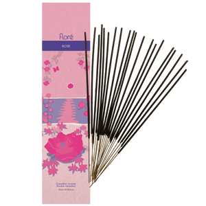
            
                Load image into Gallery viewer, Image of Flore Canadian Incense Rose package, featuring a prominent rose flower on a beach with smaller flowers around it.There are 20 incense sticks splayed beside it as every package contains 20 incense sticks. 
            
        
