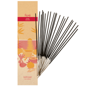 Image of Flore Canadian Incense Sage package, featuring a strawberry, orange, cinnamon stick, mortar and pestle on a warm beach. There are 20 incense sticks splayed beside it as every package contains 20 incense sticks